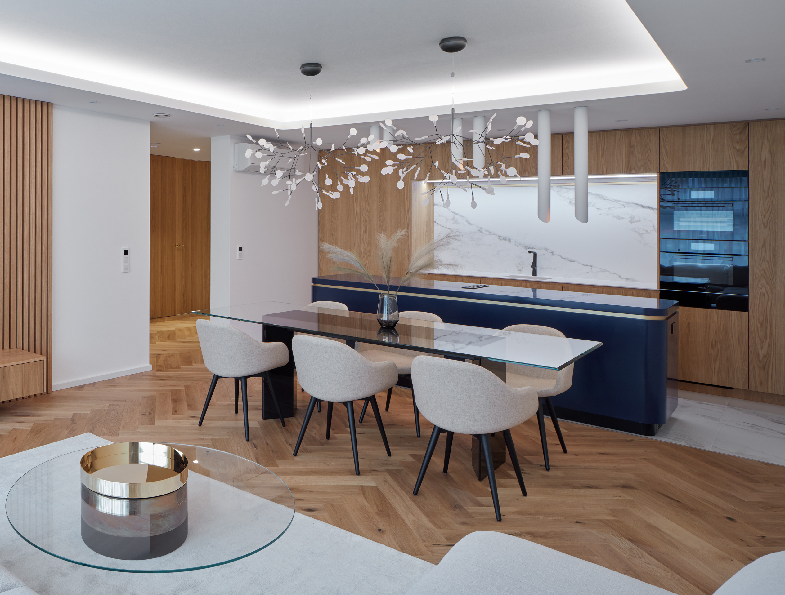 Three bedroom apartment with blue kitchen