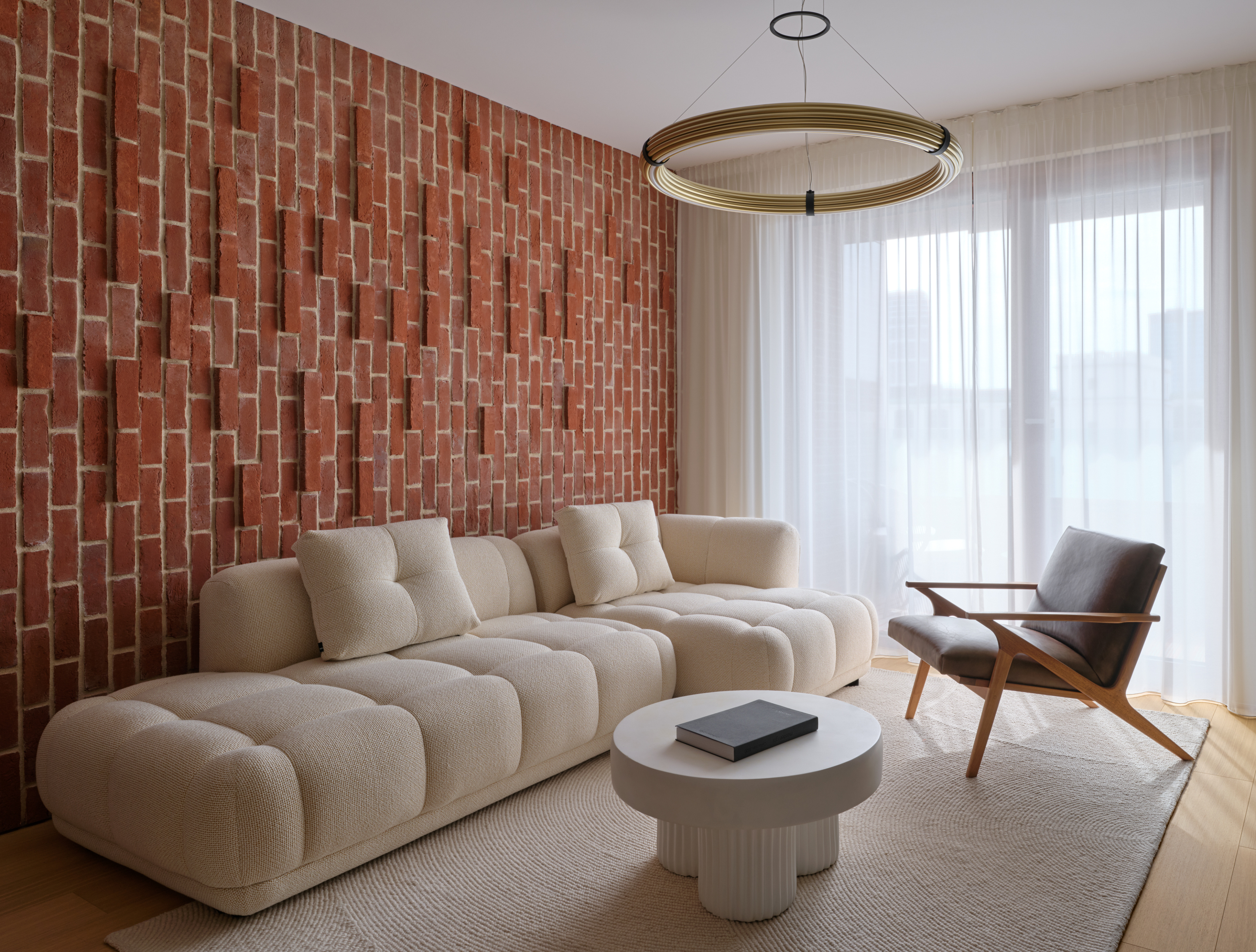 Apartment with a brick wall